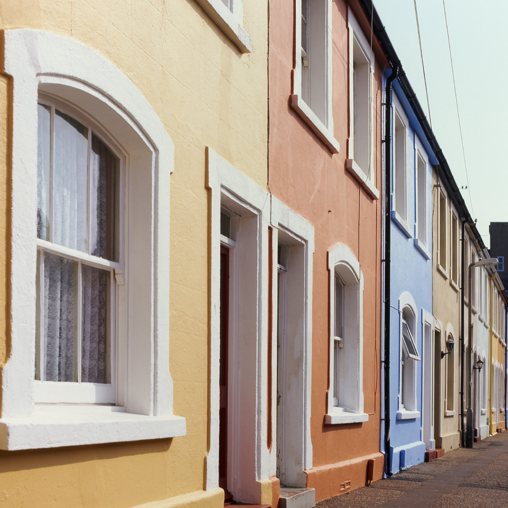 Multicoloured terraced houses in Worthing, West Sussex. England