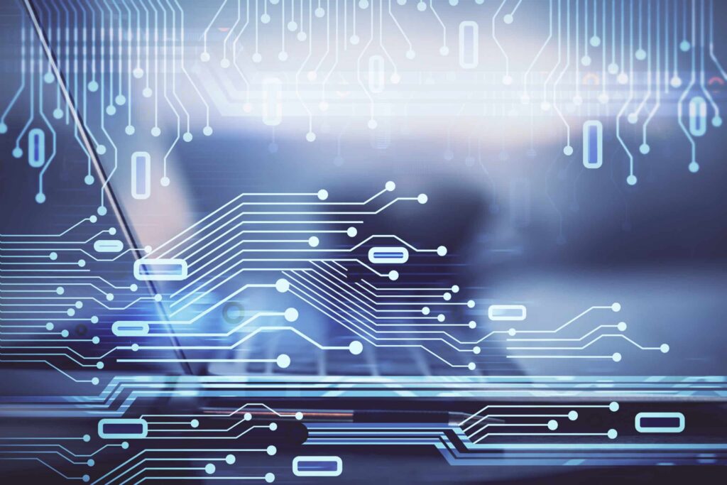 Abstract image of a laptop keyboard overlaid with a digital circuit pattern, representing technology and connectivity. The translucent circuit elements suggest using data science to improve tenant experience, seamlessly blending with the blurred background of the laptop. ©Mobysoft