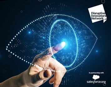 A hand reaches towards a digital, glowing blue interface that resembles an eye, with the text "Disruptive Innovators Network" and "in partnership with salesforce.org" in the corners. The background is dark, emphasizing the luminous design. ©Mobysoft