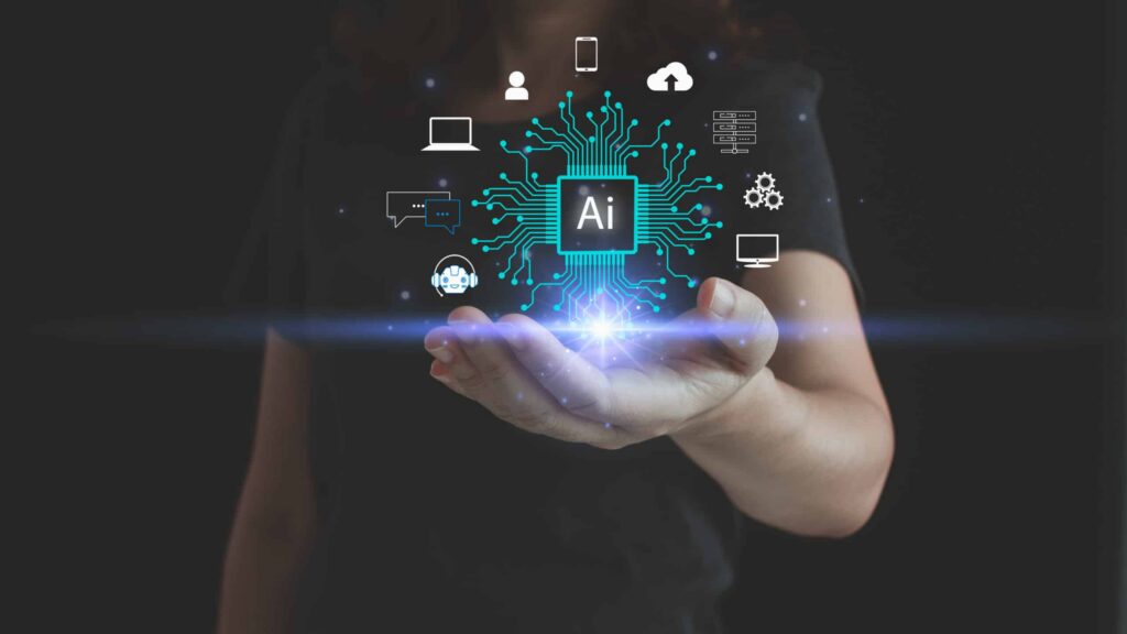 A person holds out their hand with a digital illustration of a glowing circuit and "AI" in the center. Surrounding icons represent technology, communication, and AI transparency, symbolizing the clarity and openness of artificial intelligence connections. ©Mobysoft