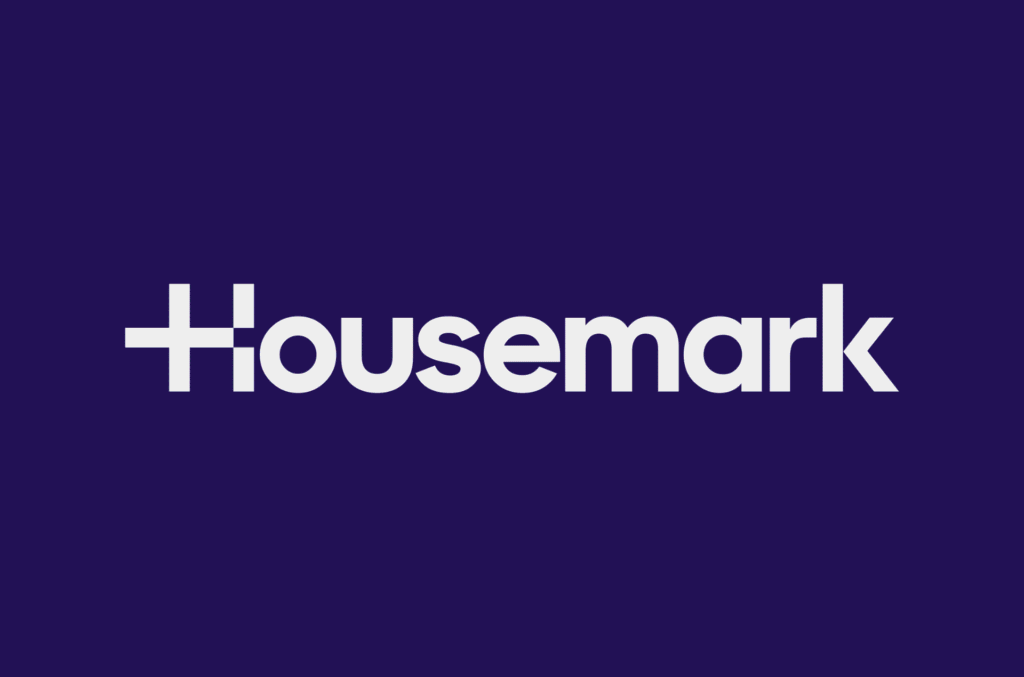 The image shows the word "Housemark" in bold white letters on a dark purple background. The letter "H" is stylized with a plus sign incorporated into its design. ©Mobysoft